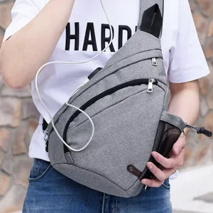 Crossbody-veske med USB-lading Ryggsekk